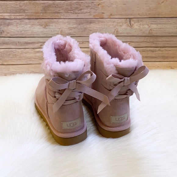 Ugg Mini Continuity Bow Boots In Pink 